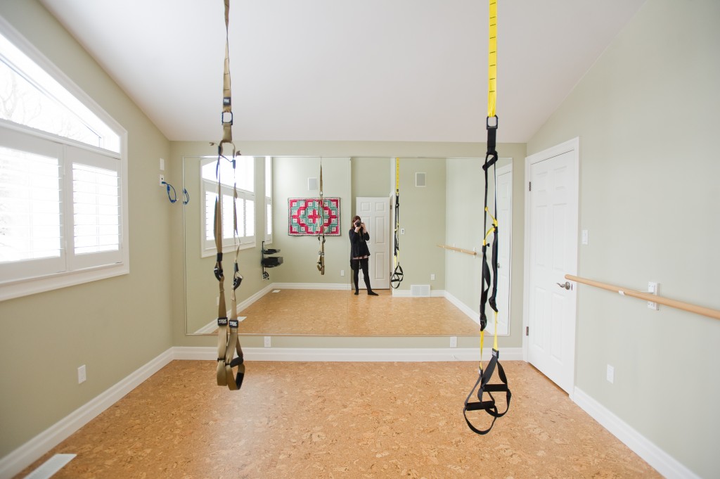 bright exercise room with cathedral ceiling
